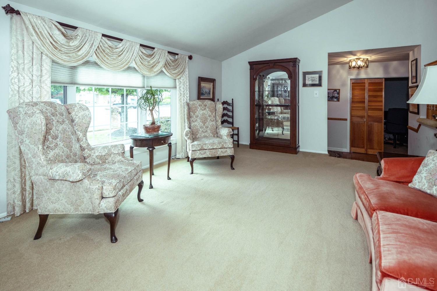 4 Overview Court Edison, NJ 08817 - Photo 6 of 44 a living room with furniture and a large window