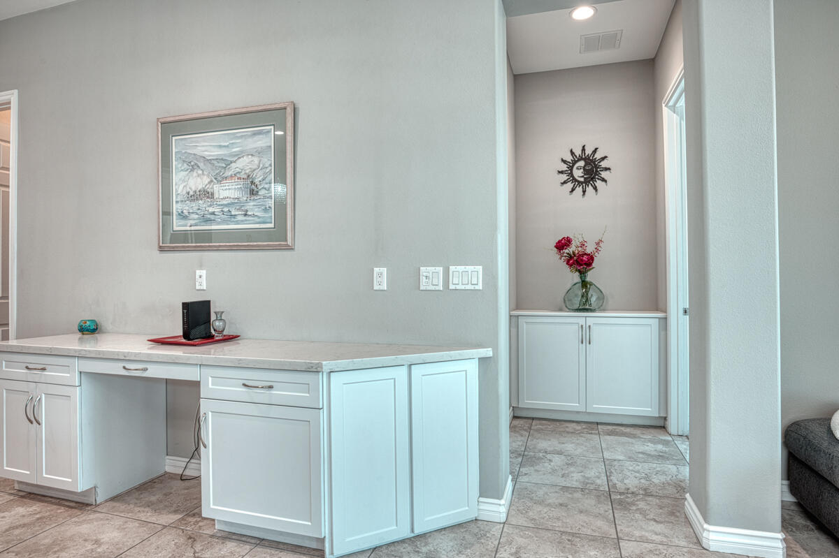 43775 Treviso Drive Indio, CA 92203 - Photo 11 of 47 a room with a white cabinets and sink