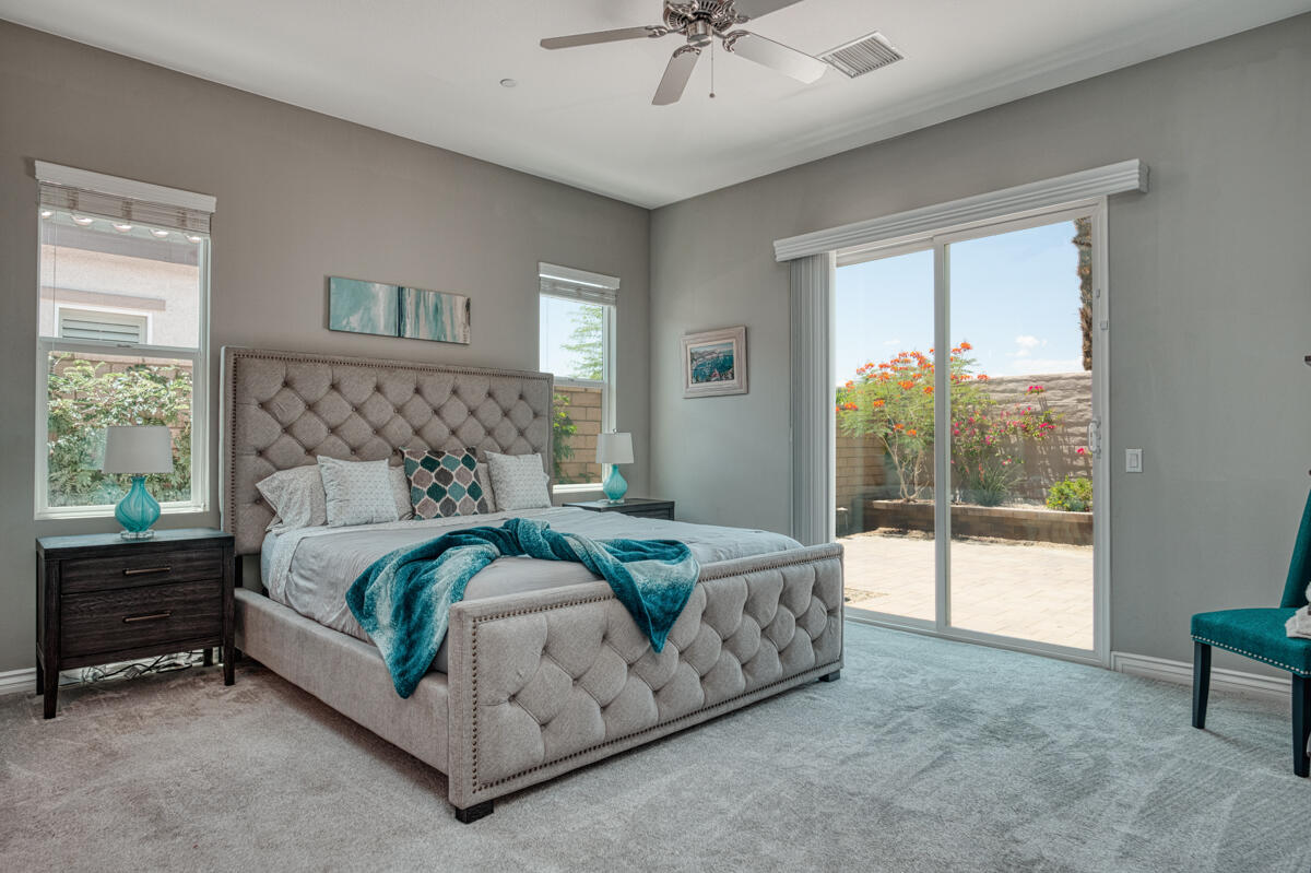 43775 Treviso Drive Indio, CA 92203 - Photo 12 of 47 a bed sitting in a bedroom next to a window