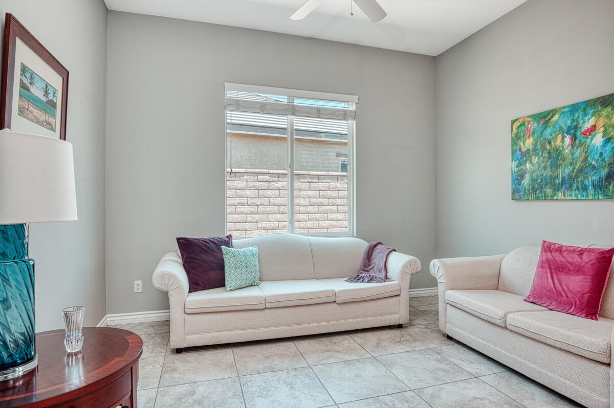 43775 Treviso Drive Indio, CA 92203 - Photo 18 of 47 a living room with furniture and a couch