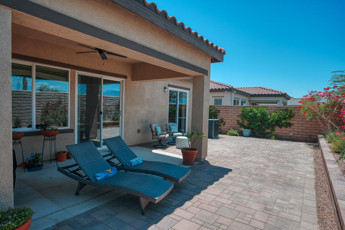 43775 Treviso Drive Indio, CA 92203 - Photo 20 of 47 a building outdoor space with patio furniture