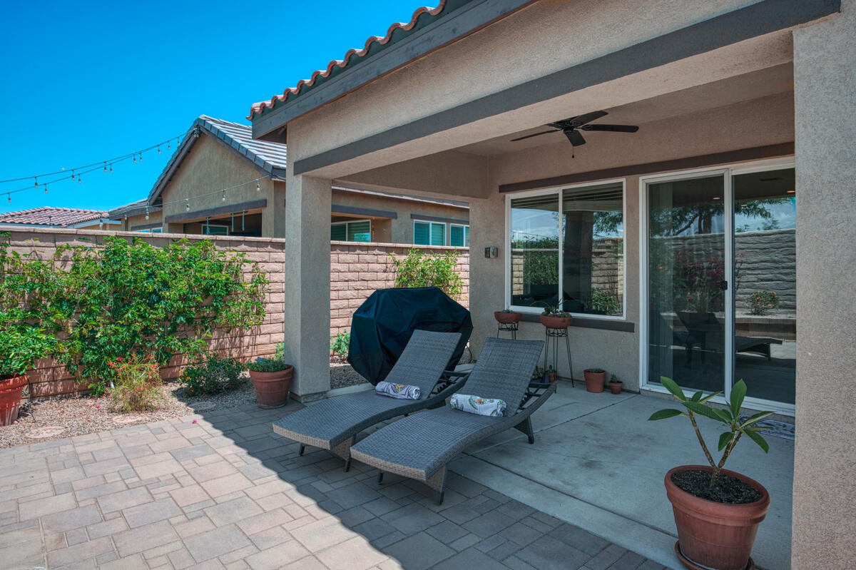 43775 Treviso Drive Indio, CA 92203 - Photo 21 of 47 a building outdoor space with patio furniture and potted plants