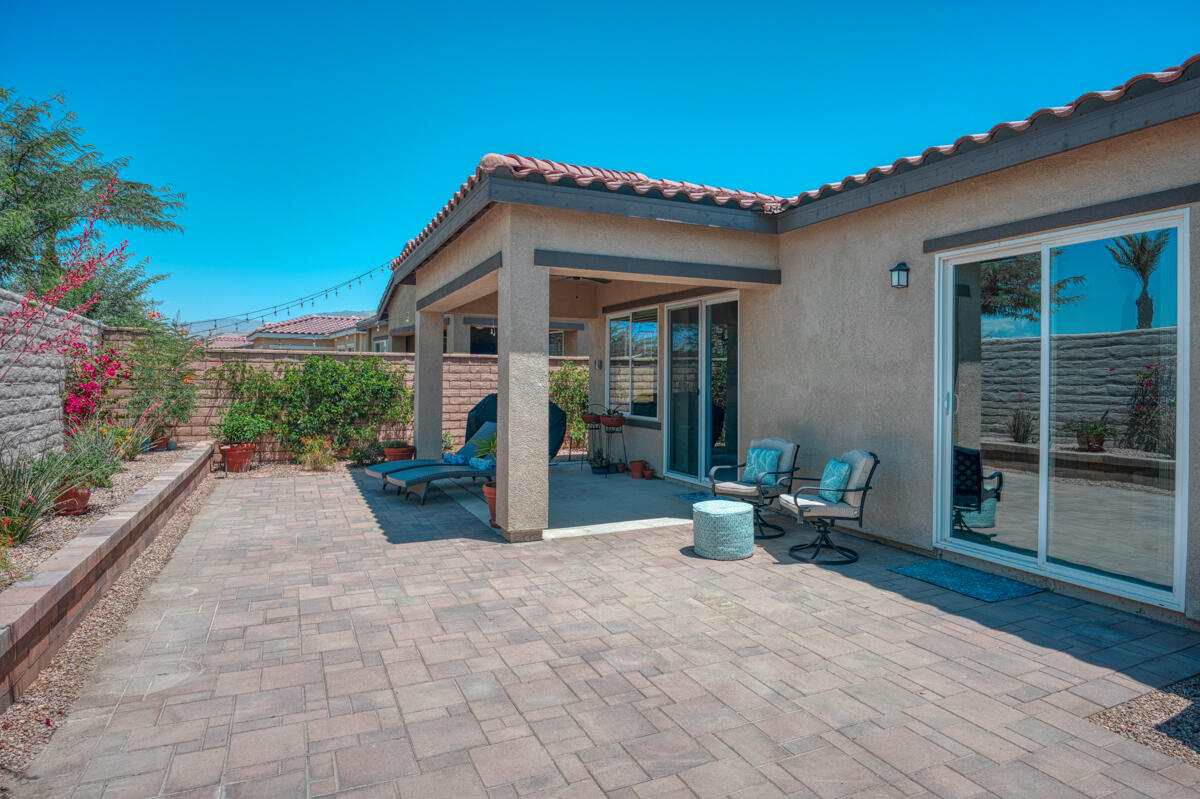 43775 Treviso Drive Indio, CA 92203 - Photo 25 of 47 a view of a house with sitting area and garden