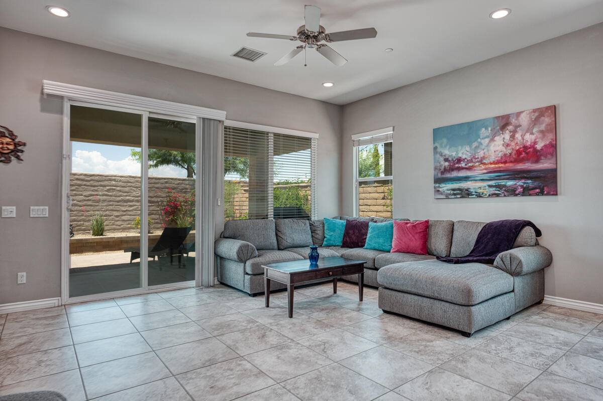 43775 Treviso Drive Indio, CA 92203 - Photo 8 of 47 a living room with furniture and a large window