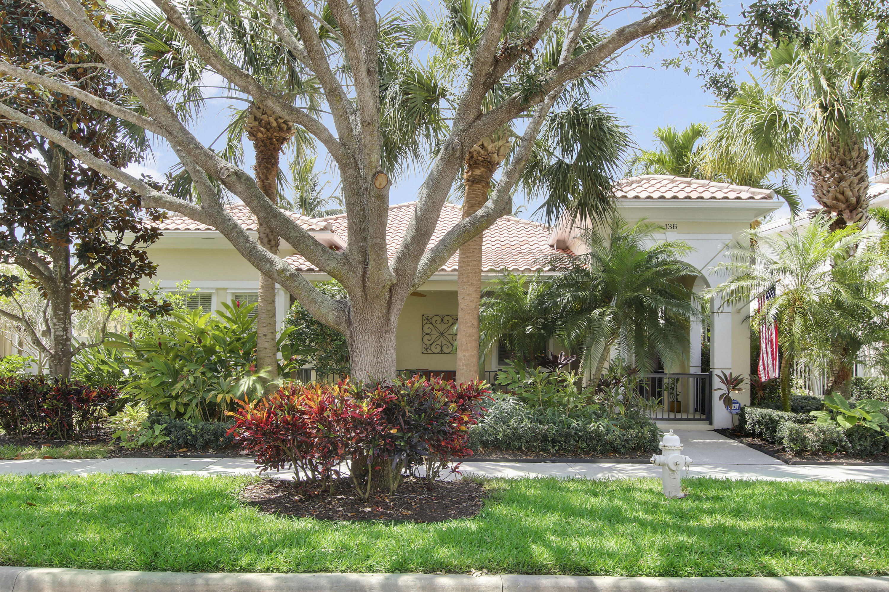 136 Florence Drive Jupiter, FL 33458 - Photo 2 of 51 Lushly Landscaped Home