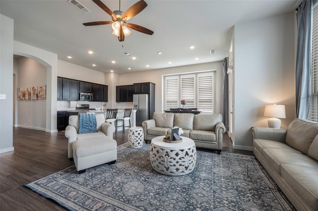 5664 Durst Lane Forney, TX 75126 - Photo 4 of 26 a living room with furniture and view of kitchen