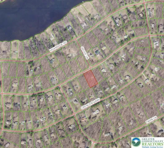 a view of a white wall with a window