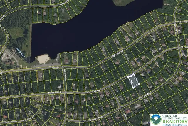 a white bath tub sitting next to a white door