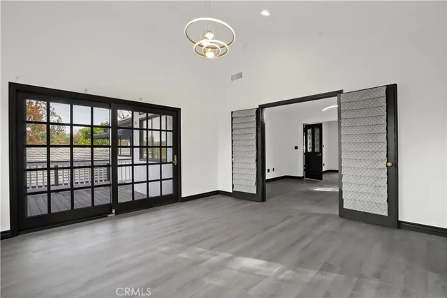 a view of a room with a large window