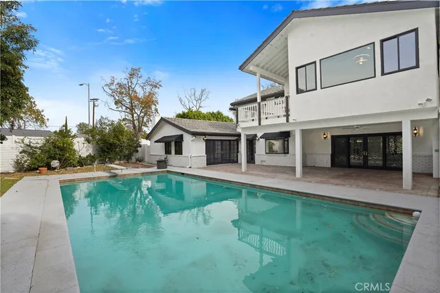 a view of a house with pool