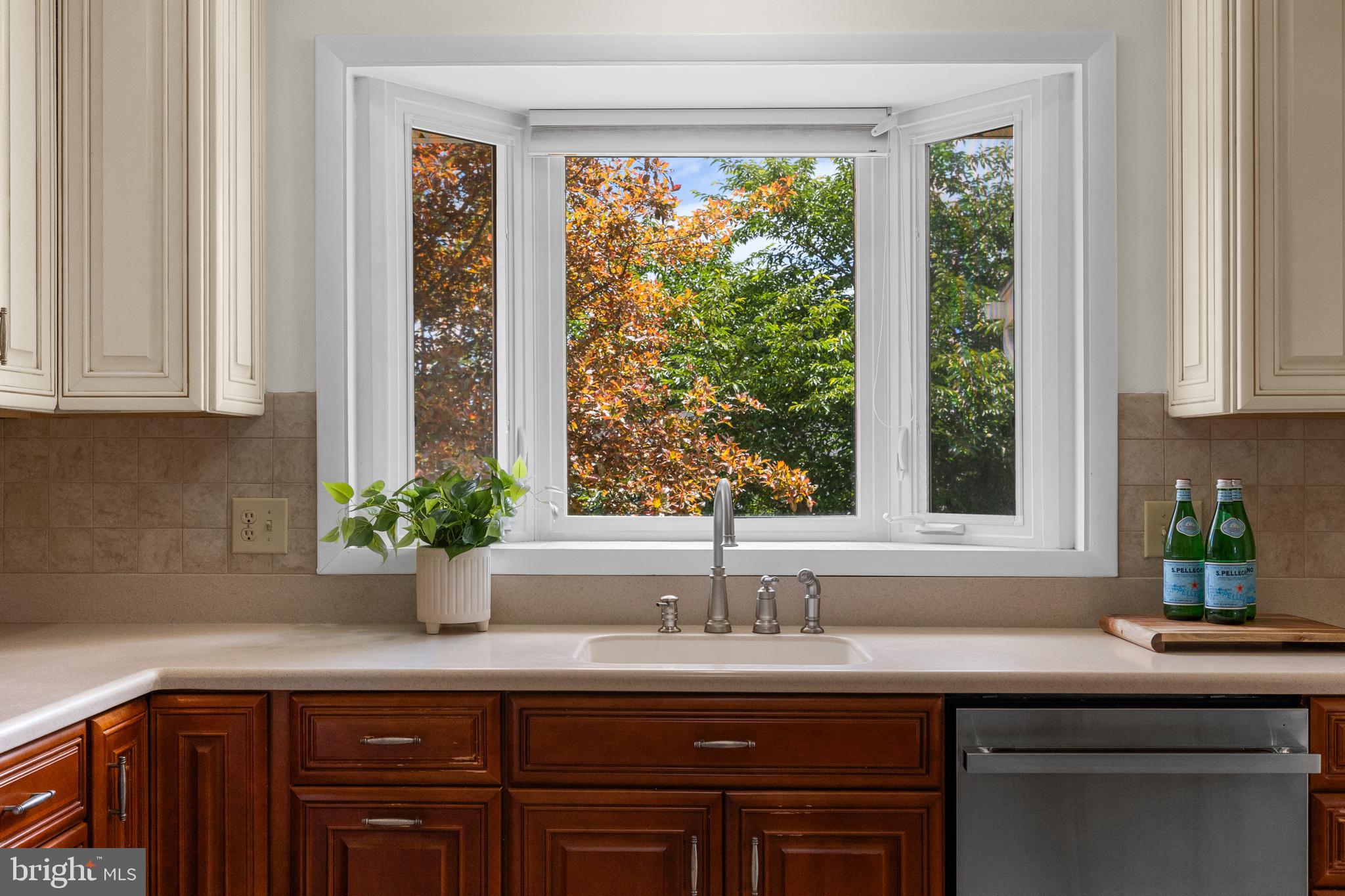 15007 Carlbern Drive Centreville, VA 20120 - Photo 21 of 47 a kitchen with a sink and window