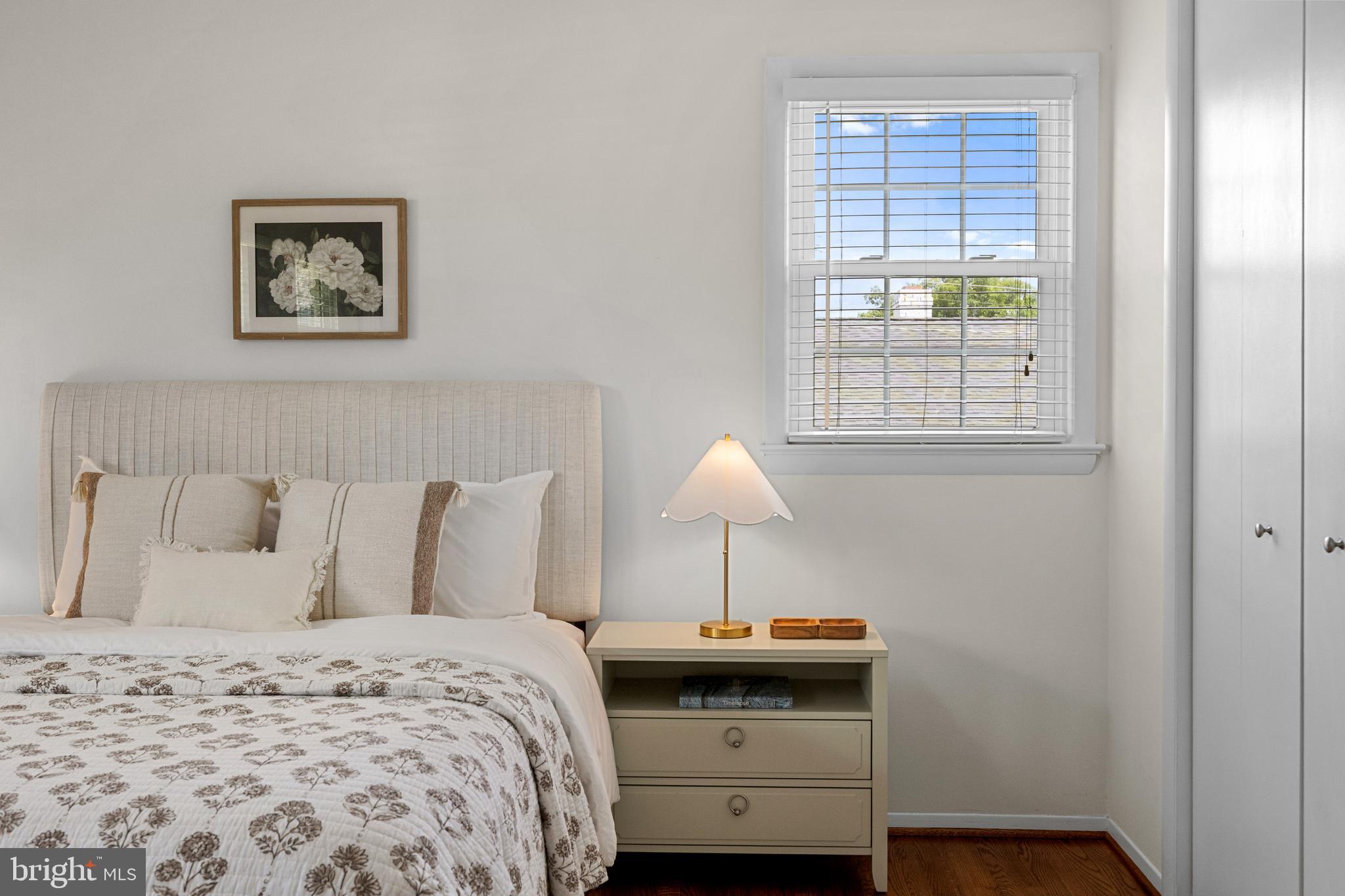 15007 Carlbern Drive Centreville, VA 20120 - Photo 32 of 47 a bedroom with a bed and a window