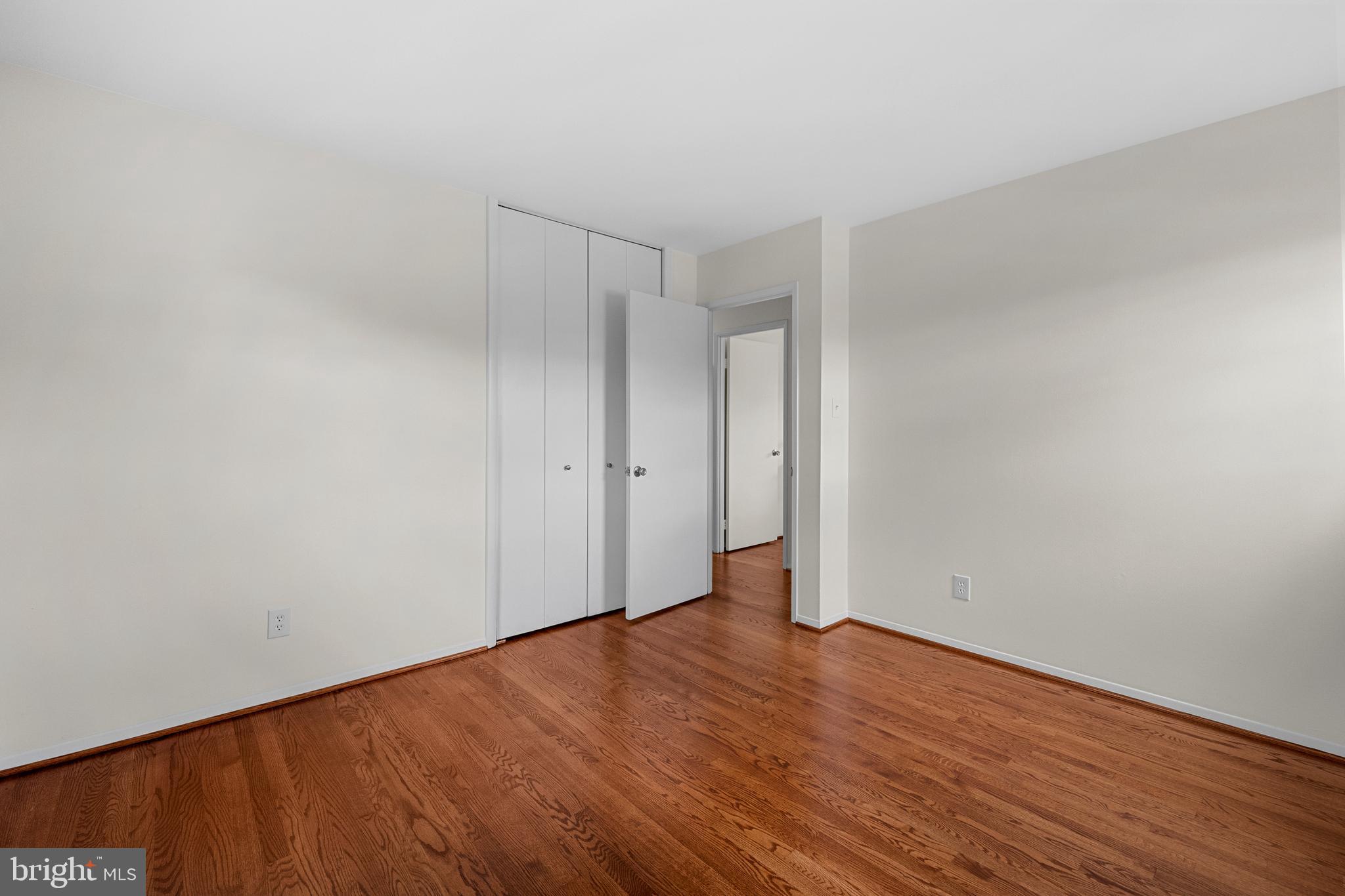 15007 Carlbern Drive Centreville, VA 20120 - Photo 34 of 47 a view of an empty room with wooden floor