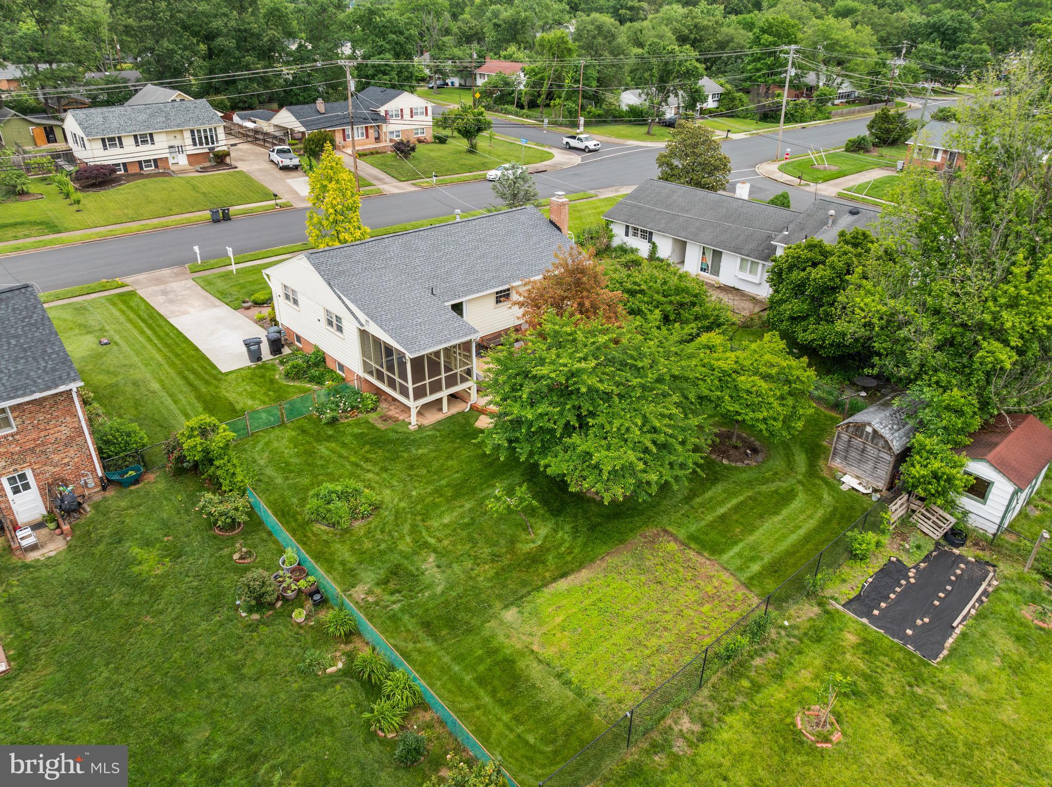 15007 Carlbern Drive Centreville, VA 20120 - Photo 9 of 47 an aerial view of a house with garden space and street view
