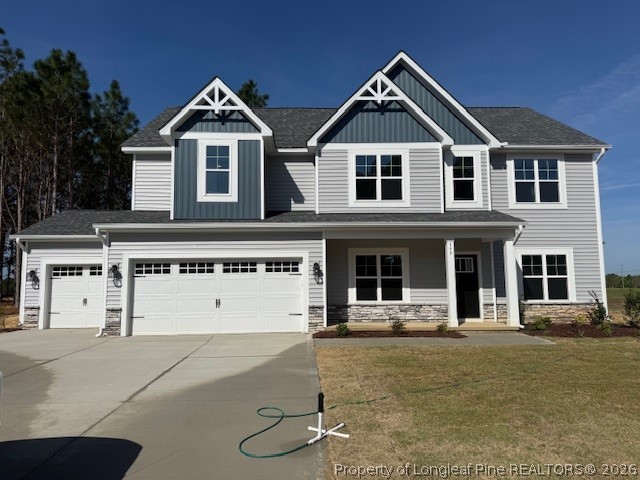 159 Rabbit Run Drive Smithfield, NC 27577 - Photo 1 of 21 a front view of a house with garage