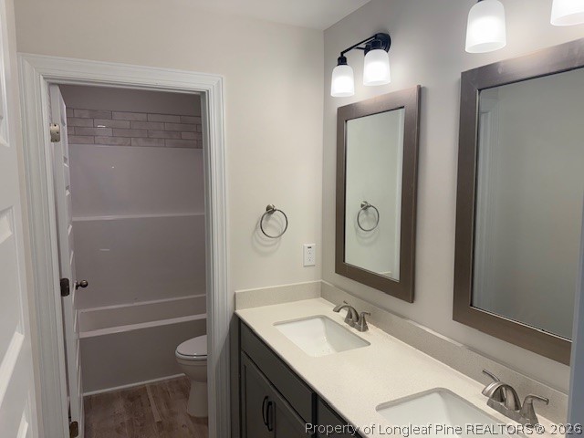 159 Rabbit Run Drive Smithfield, NC 27577 - Photo 12 of 21 a bathroom with a sink vanity toilet and shower