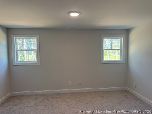 159 Rabbit Run Drive Smithfield, NC 27577 - Photo 14 of 21 an empty room with a window
