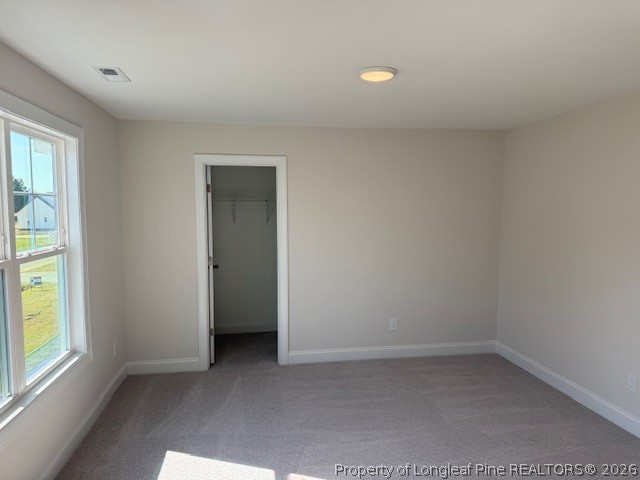 159 Rabbit Run Drive Smithfield, NC 27577 - Photo 17 of 21 an empty room with a window