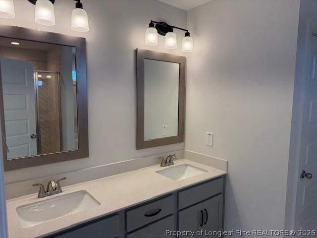 159 Rabbit Run Drive Smithfield, NC 27577 - Photo 18 of 21 a bathroom with a sink and a mirror