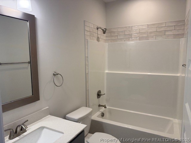 159 Rabbit Run Drive Smithfield, NC 27577 - Photo 8 of 21 a bathroom with a shower curtain and a sink