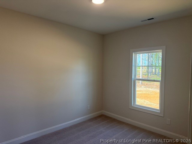 159 Rabbit Run Drive Smithfield, NC 27577 - Photo 9 of 21 an empty room with a window