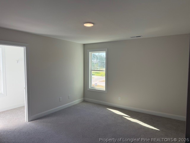 159 Rabbit Run Drive Smithfield, NC 27577 - Photo 10 of 21 a view of an empty room with a window