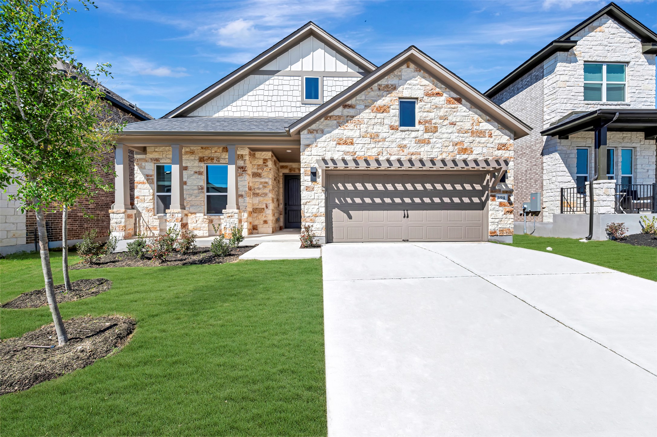 394 Bishop Wood Road Dripping Springs, TX 78620 - Photo 1 of 1 a view of a house with a yard