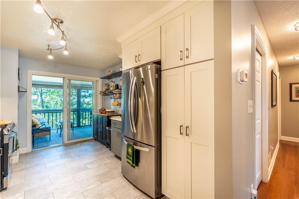 228 Country View Drive Lower Burrell, PA 15068 - Photo 13 of 49 a kitchen with stainless steel appliances a refrigerator and a sink