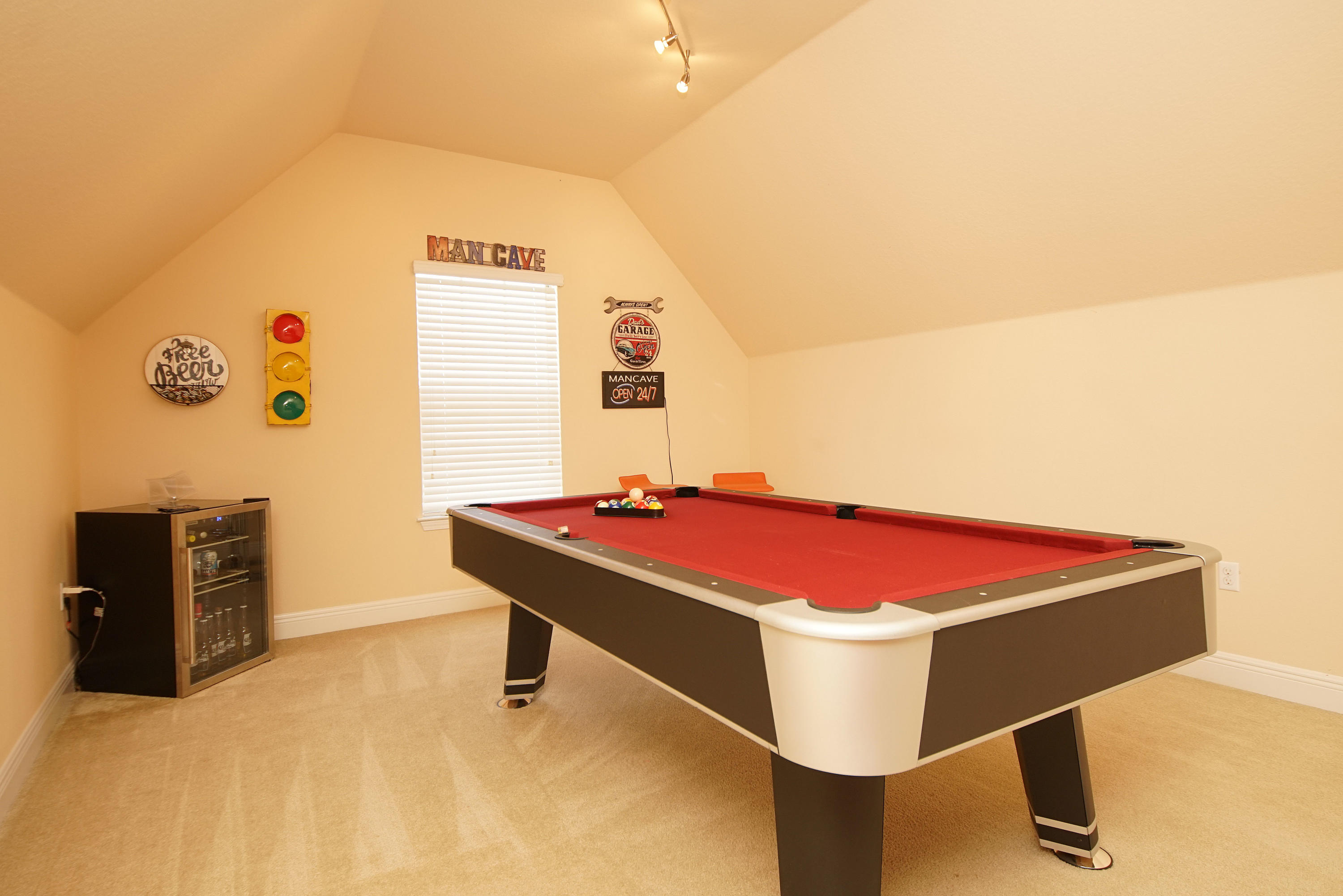 657 Red Fern Road Crestview, FL 32536 - Photo 38 of 58 a room with pool table and a chandelier