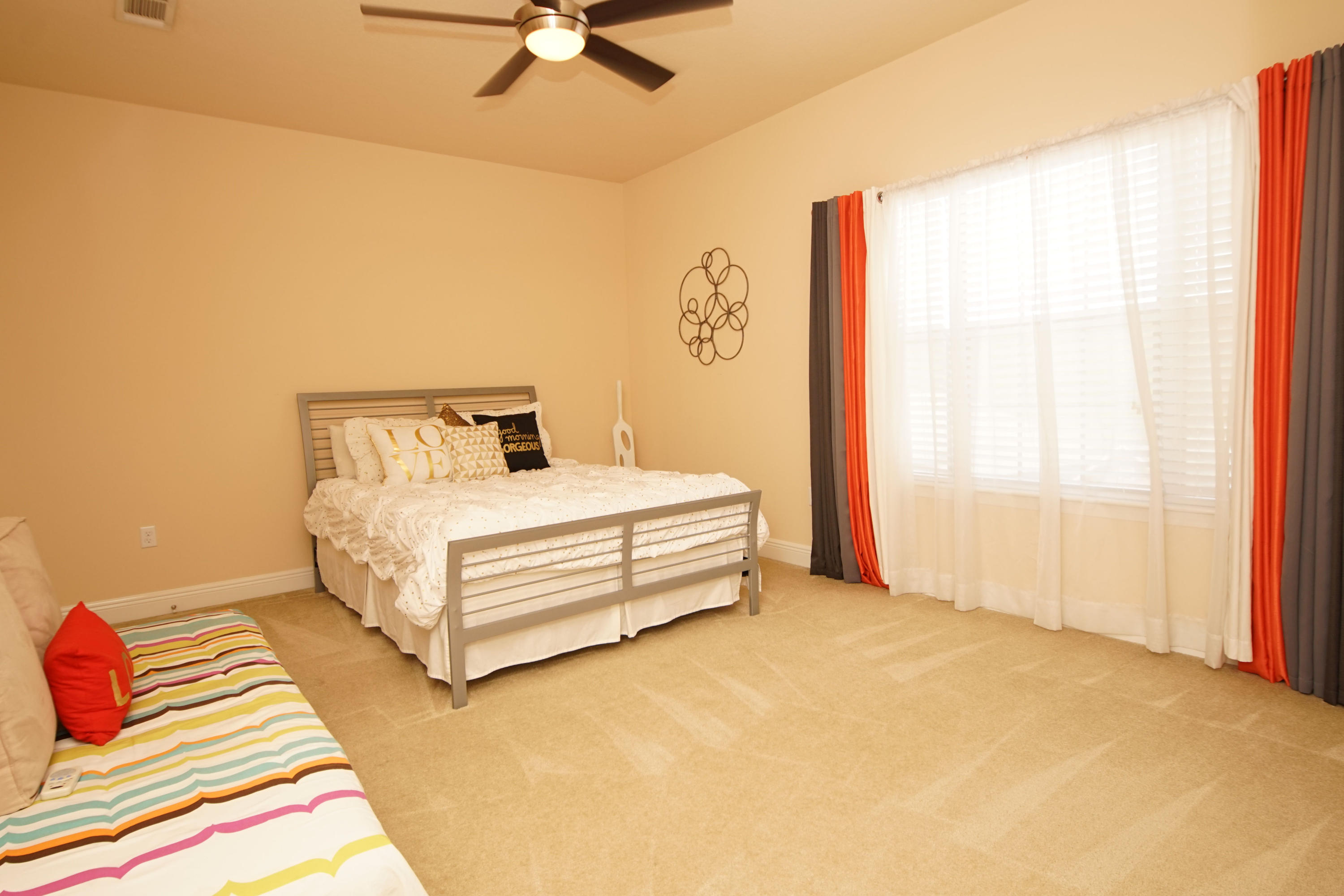 657 Red Fern Road Crestview, FL 32536 - Photo 41 of 58 a bedroom with a bed and a window