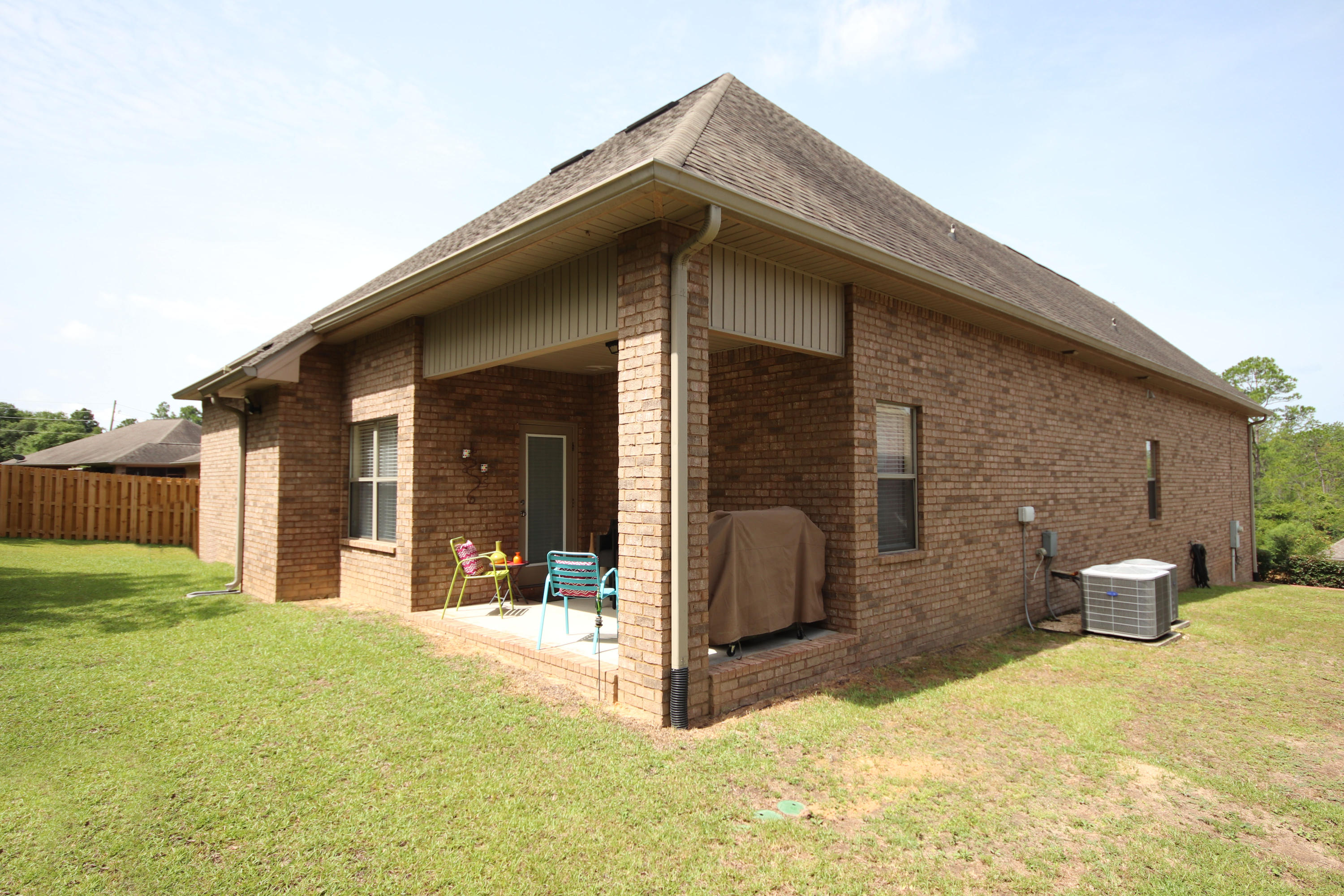 657 Red Fern Road Crestview, FL 32536 - Photo 54 of 58 a view of a house with a yard