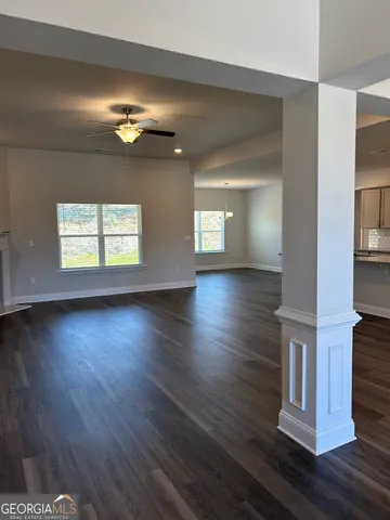 a view of a livingroom with wooden floor