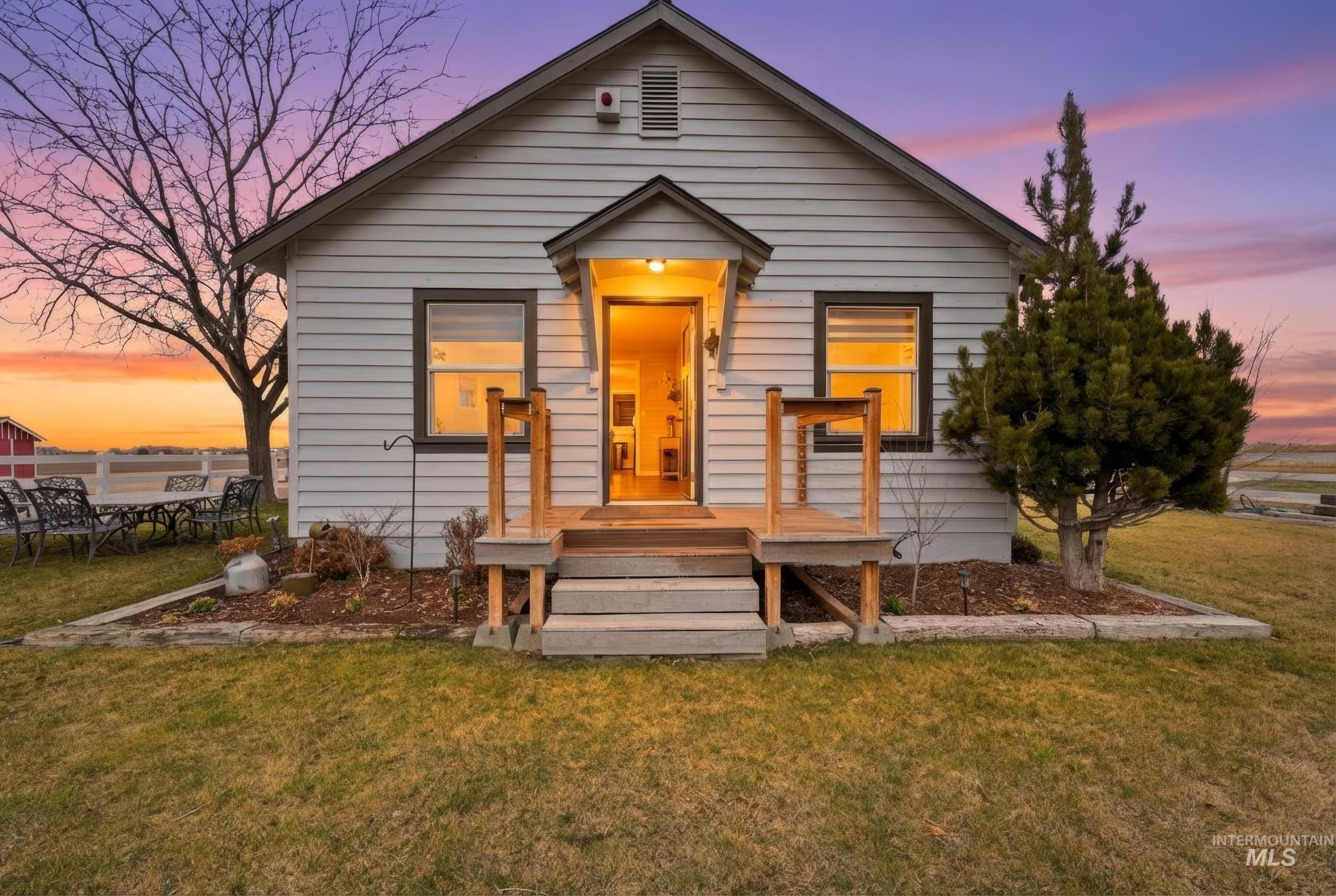 9762 Deer Flat Road Nampa, ID 83686 - Photo 11 of 24 Bungalow-style house with a yard