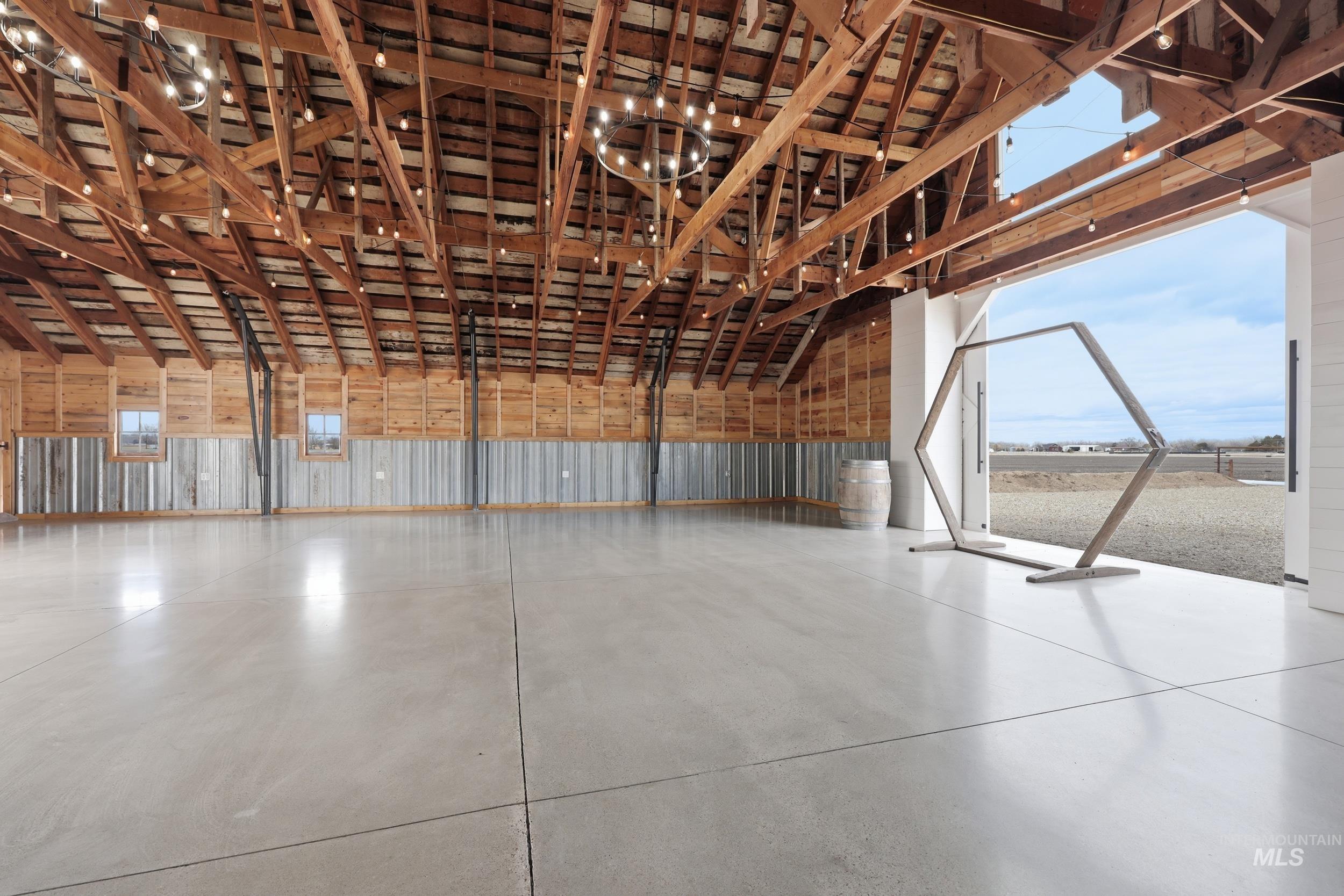 9762 Deer Flat Road Nampa, ID 83686 - Photo 13 of 24 Misc room featuring finished concrete floors and plenty of natural light