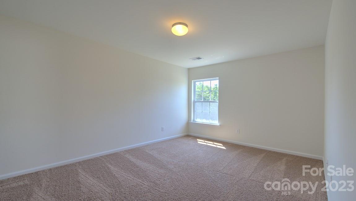 1374 Mifflin Lane Dallas, NC 28034 - Photo 12 of 20 a view of an empty room with a window