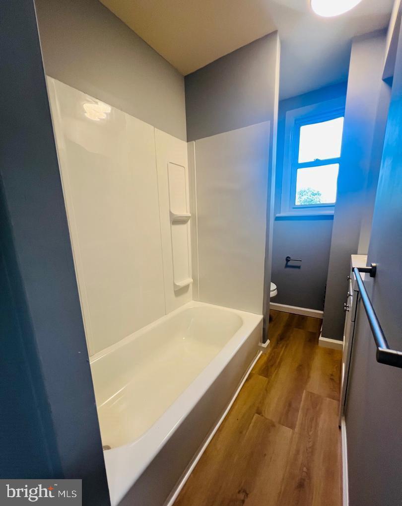 617 3rd Street Beverly, NJ 08010 - Photo 11 of 16 a bathroom with a tub