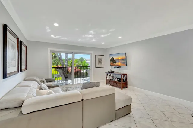 a living room with furniture and a gate