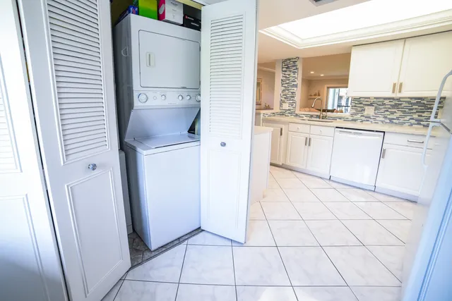 a bathroom with a sink a mirror and a bathtub
