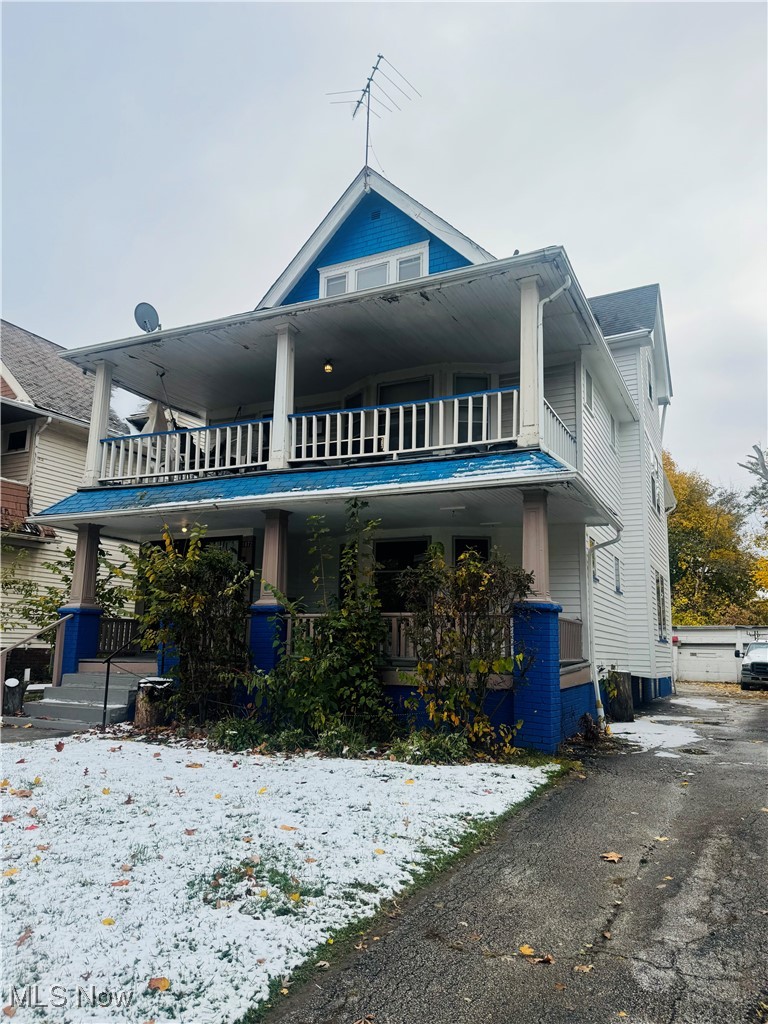 1872 Lampson Road Cleveland, OH 44112 - Photo 3 of 28 View of front of house with a balcony