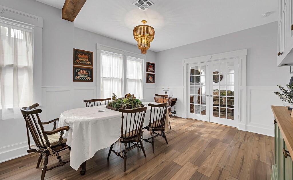 2612 Fort Avenue Waco, TX 76707 - Photo 14 of 40 a view of a dining room with furniture window and wooden floor