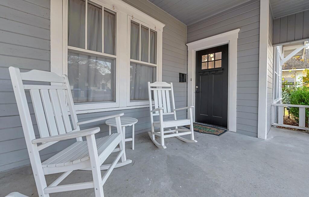 2612 Fort Avenue Waco, TX 76707 - Photo 2 of 40 a view of an empty room with wooden floor and a window