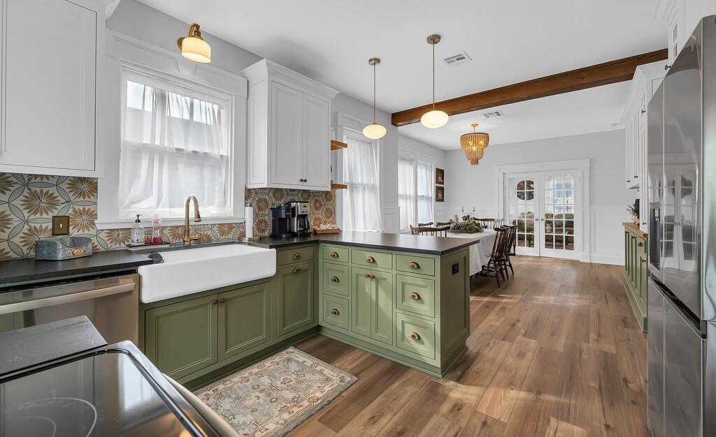 2612 Fort Avenue Waco, TX 76707 - Photo 21 of 40 a kitchen with sink cabinets and window