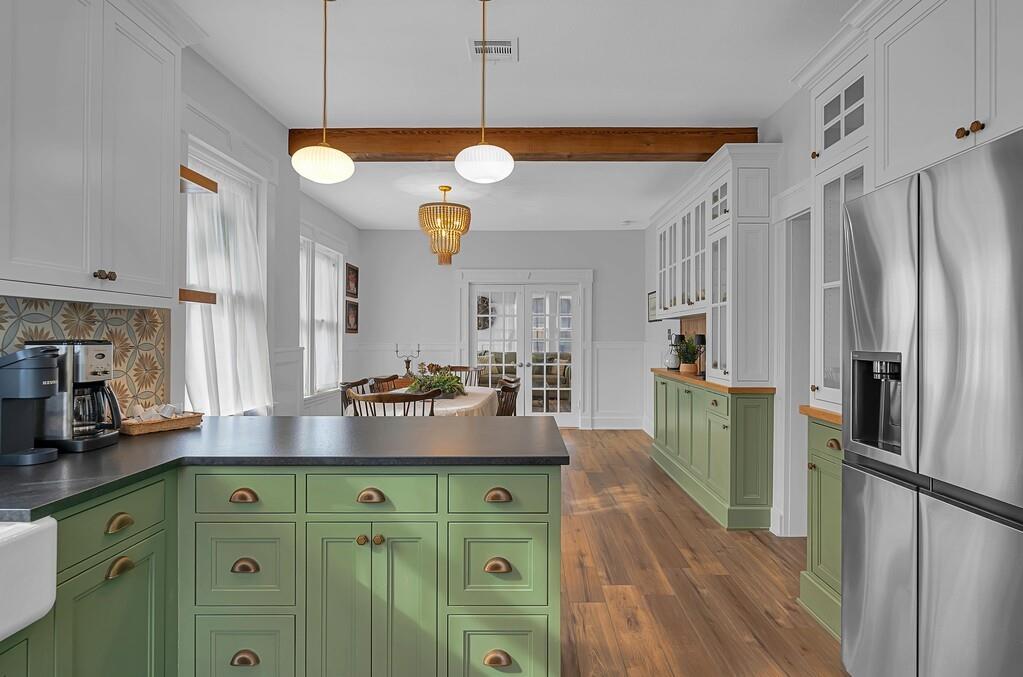2612 Fort Avenue Waco, TX 76707 - Photo 24 of 40 a kitchen with cabinets a counter space and stainless steel appliances