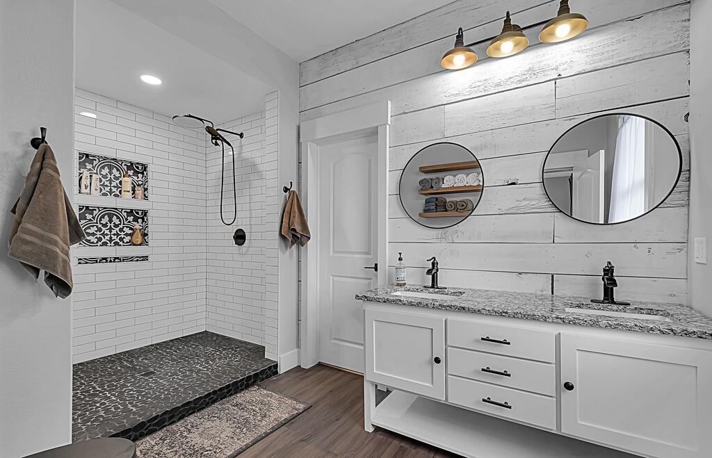 2612 Fort Avenue Waco, TX 76707 - Photo 30 of 40 a bathroom with a granite countertop sink mirror and vanity