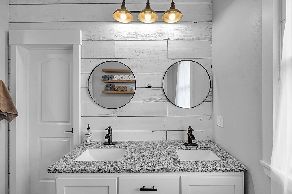 2612 Fort Avenue Waco, TX 76707 - Photo 31 of 40 a bathroom with a sink and a mirror