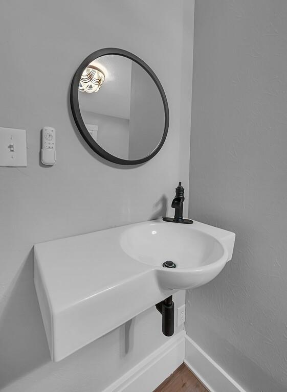 2612 Fort Avenue Waco, TX 76707 - Photo 35 of 40 a bathroom with a sink and a mirror