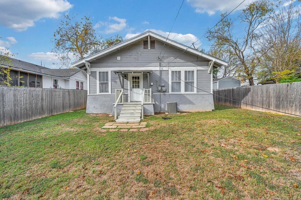 2612 Fort Avenue Waco, TX 76707 - Photo 37 of 40 a front view of a house with a yard table and chairs