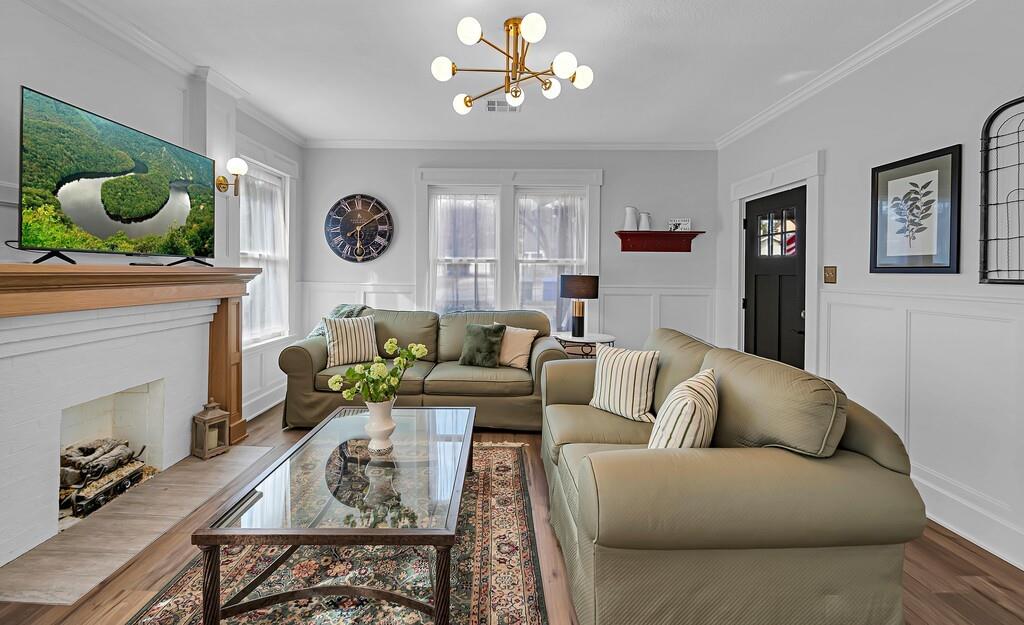 2612 Fort Avenue Waco, TX 76707 - Photo 7 of 40 a living room with furniture a fireplace and a window