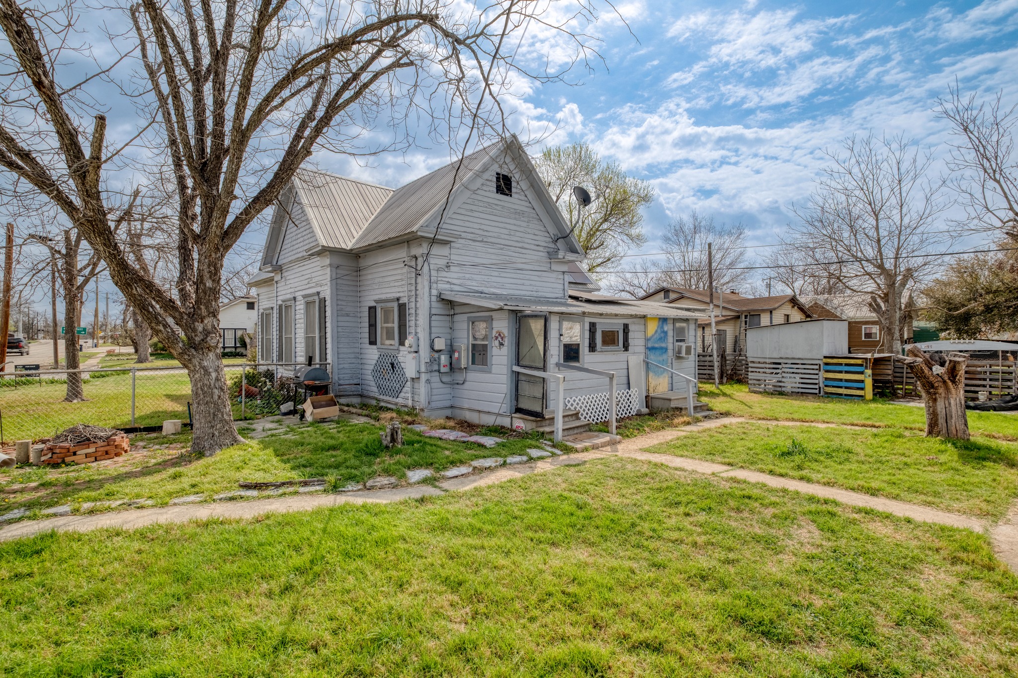 300 Rio Grande Street Granger, TX 76530 - Photo 20 of 25 a view of a house with backyard and sitting area