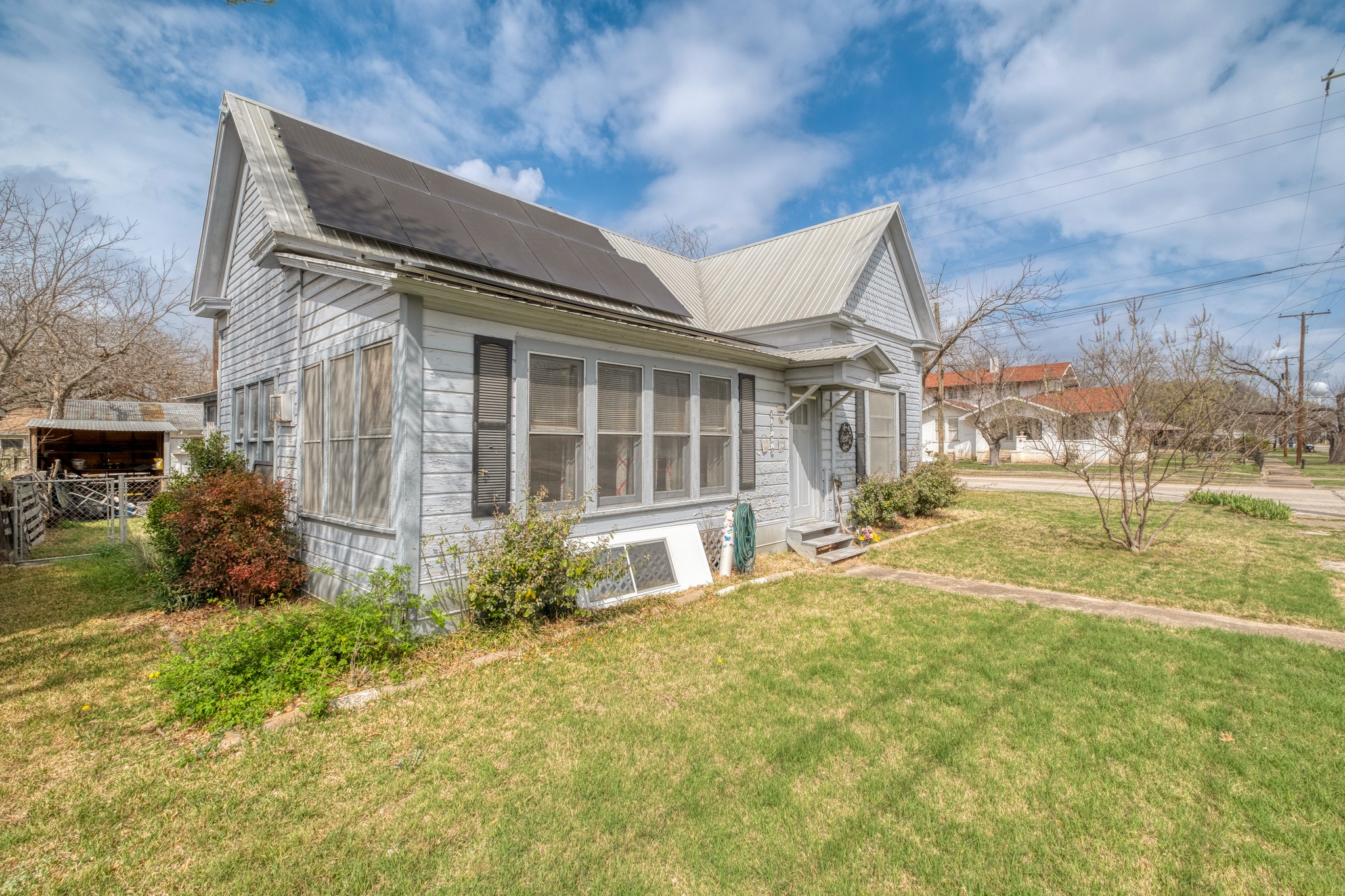 300 Rio Grande Street Granger, TX 76530 - Photo 2 of 25 a house view with swimming pool in front of it